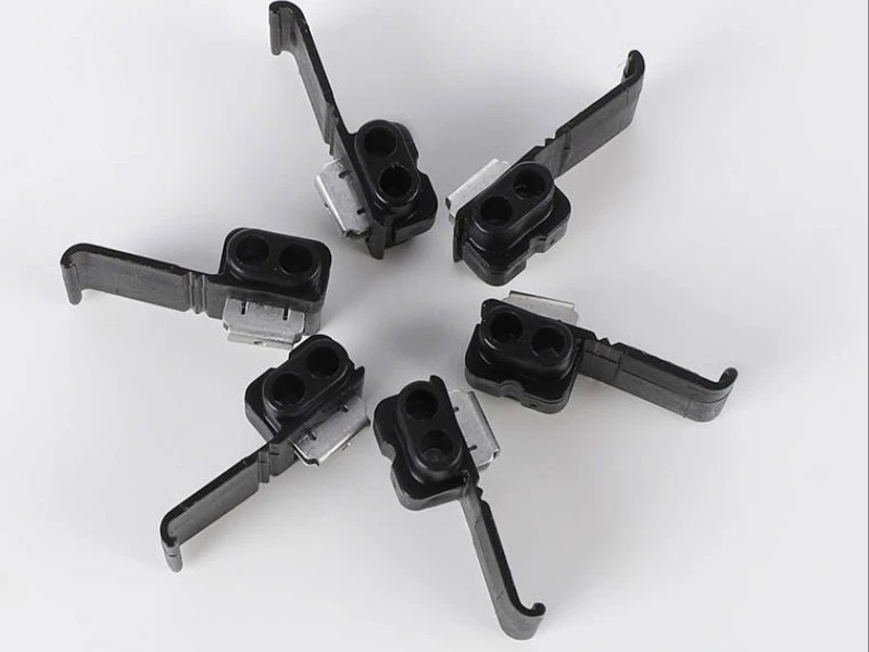 557TG connectors showing open body structure and wire entry holes