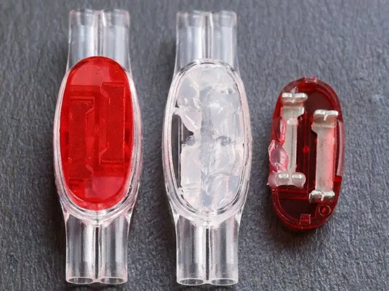 U1R connector open cap showing internal contact elements